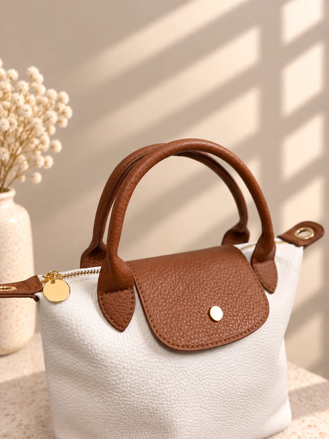 Bolsa Lia branca com asas em pele castanha